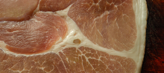 Smoked gammon steak formed from selected cuts of cured pork leg