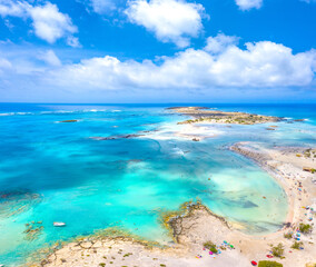 Fototapeta na wymiar Tropical sandy beach with turquoise water, in Elafonisi, Crete, Greece