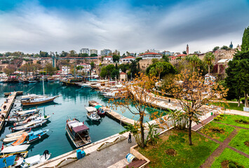Fototapeta na wymiar The old harbour view in Antalya (Kaleici), Turkey. Old town of Antalya is a popular destination among tourists