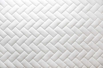 Close up shot of white orthopedic mattress top side surface pattern with a lot of copy space for text. Hypoallergenic foam matress for proper spinal alingment and pressure point relief. Background.