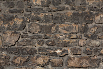 Brick stone wall. Masonry or brickwork of antique construct. Texture or background.