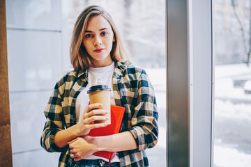 Half length portrait of attractive caucasian female blogger