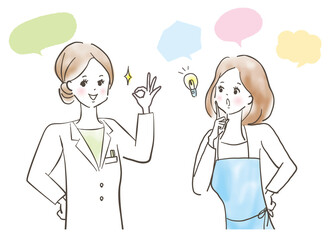 白衣を着た女性医師に悩みを相談する若い女性/主婦