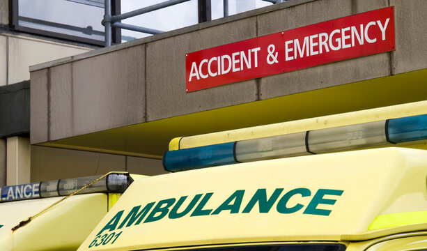  Accident & Emergency and Ambulance  signs close together, one above the other,  outside an NHS hospital in the UK