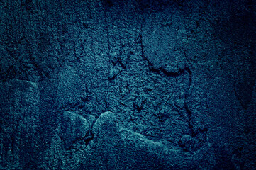 Dark blue abstract background. Stucco texture.