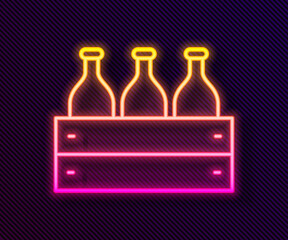Glowing neon line Bottles of wine in a wooden box icon isolated on black background. Wine bottles in a wooden crate icon. Vector Illustration.