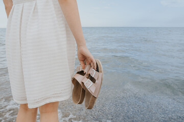 woman with beach slippers 