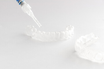 Teeth tray for dental whitening opalescence and bleaching gel syringe