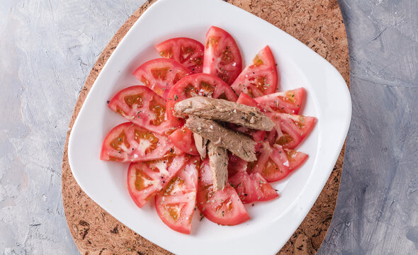 Seasoned tomato with melva ready to eat. Spanish restaurant dish