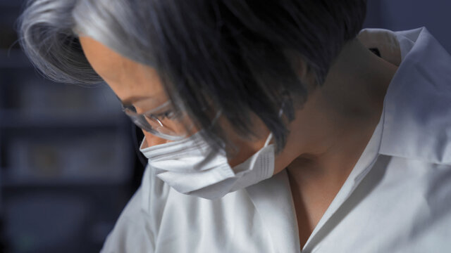 Overworked Doctor Exhausted By Workload. Profile View Of Mature Woman In Protective Mask And Medical Uniform Looking Side Down. Close Up Portrait. Tinted Image.