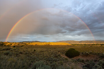 Fototapeta na wymiar Full Summer Rainbow over New Mexico High Desert
