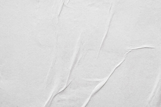Blank white crumpled and creased paper poster texture background