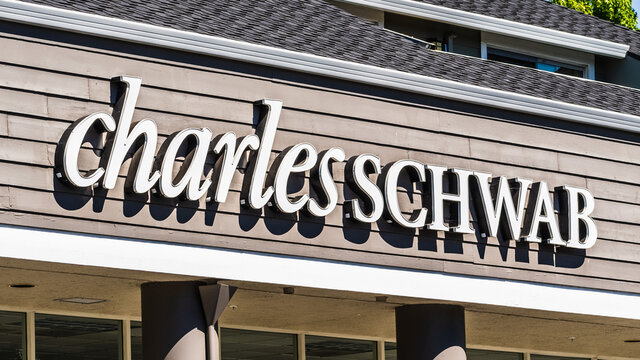June 10, 2020 Sunnyvale / CA / USA - Close up of Charles Schwab sign displayed at a branch in South San Francisco Bay Area; The Charles Schwab Corporation is a bank and stock brokerage firm