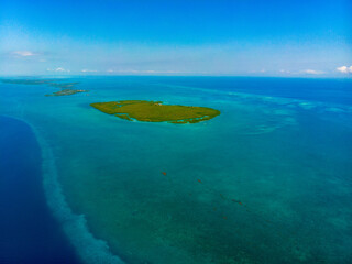 Naklejka na ściany i meble Blue Hole Belize and Light House Reef from a drone