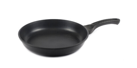 Metal black frying pan with a non stick coating composition isolated over the white background