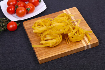 Raw pasta fettuccini