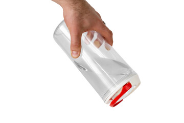 sealed food jar on a white background in your hand