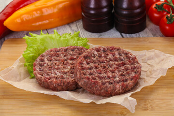 Raw burger cutlet