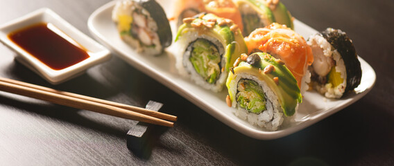 Traditional sushi roll set on plate