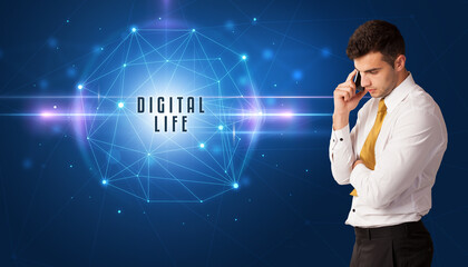 Businessman thinking about security solutions with DIGITAL LIFE inscription