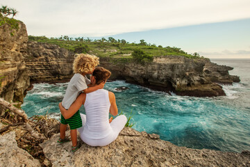Mom with son by the ocean