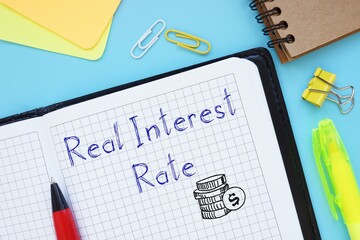 Financial concept about Real Interest Rate with sign on the page.
