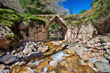 ELEUTHERNA, CRETE, GREECE . The ancient corbel arch bridge (probably hellenistic - 3rd century BC), in the archaeological site of Ancient Eleutherna, Rethymno. © Iraklis Milas