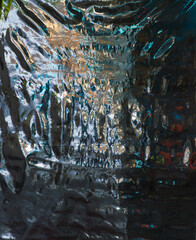 abstract bright shiny dark color crumpled surface