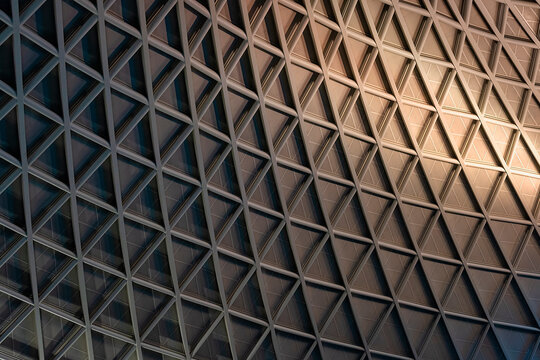 Architectural geometric triangular pattern with graduated lighting