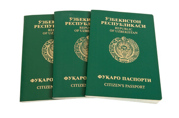 Uzbekistan passports isolated on white background