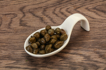 Tasty capers in the bowl
