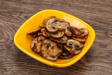 Roasted champignon with herbs and spices