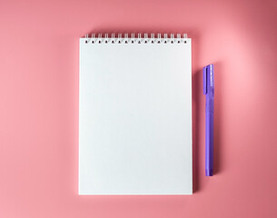 Top view of blank note paper with pen. Back to school and education concept.