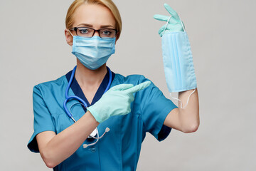 medical doctor nurse woman with stethoscope wearing protective mask and rubber or latex gloves