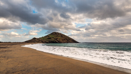 sa mesquida beach in a stormy day, abandoned paradise beach in Menorca, a Spanish Mediterranean island, after the covid 19 coronavirus crisis
