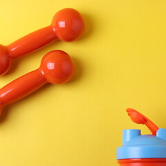 different fitness or stay healthy concept items on yellow background. minimalism style