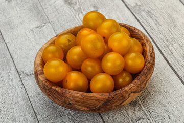 Fototapeta na wymiar Fresh yellow cherry tomato heap
