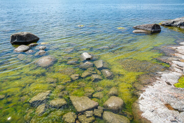 Coastal view of Porkkalanniemi, stones in the water and Gulf of Finland, Kirkkonummi, Finland