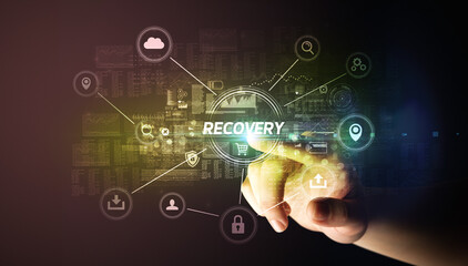 Hand touching RECOVERY inscription, Cybersecurity concept