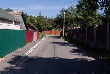 street in the village in the summer with blue sky