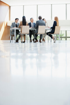 Business People Meeting At Table In Conference Room