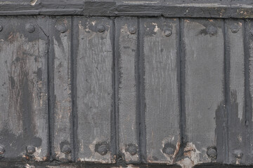 Old wooden cladding of ship as background.