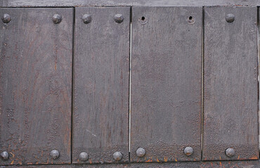 Old wooden cladding of ship as background.