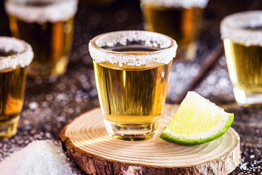 several glasses of tequila, a traditional mexican drink. International tequila day celebrated on July 24