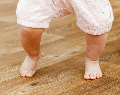 Baby Feet On Linoleum, First Step, Close-up