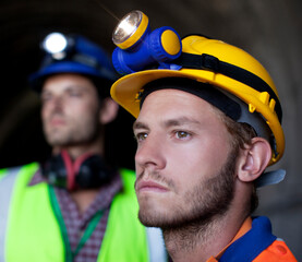 Close up of worker's face in tunnel