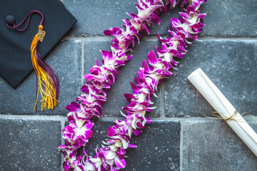 Graduation 2020 with mortar, lei and diploma