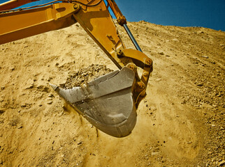Digger working in quarry