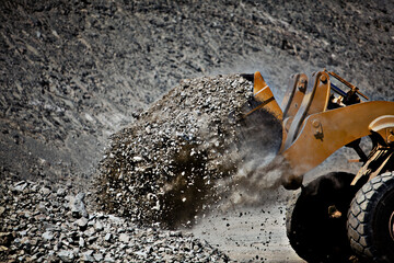 Digger working in quarry
