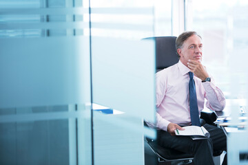 Businessman thinking at desk